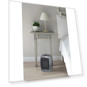 Portable Indoor Electric Ceramic Space Heater with Thermostat — Portable Heating Solutions, Lasko